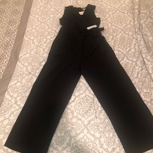 Black sleeveless jumpsuit